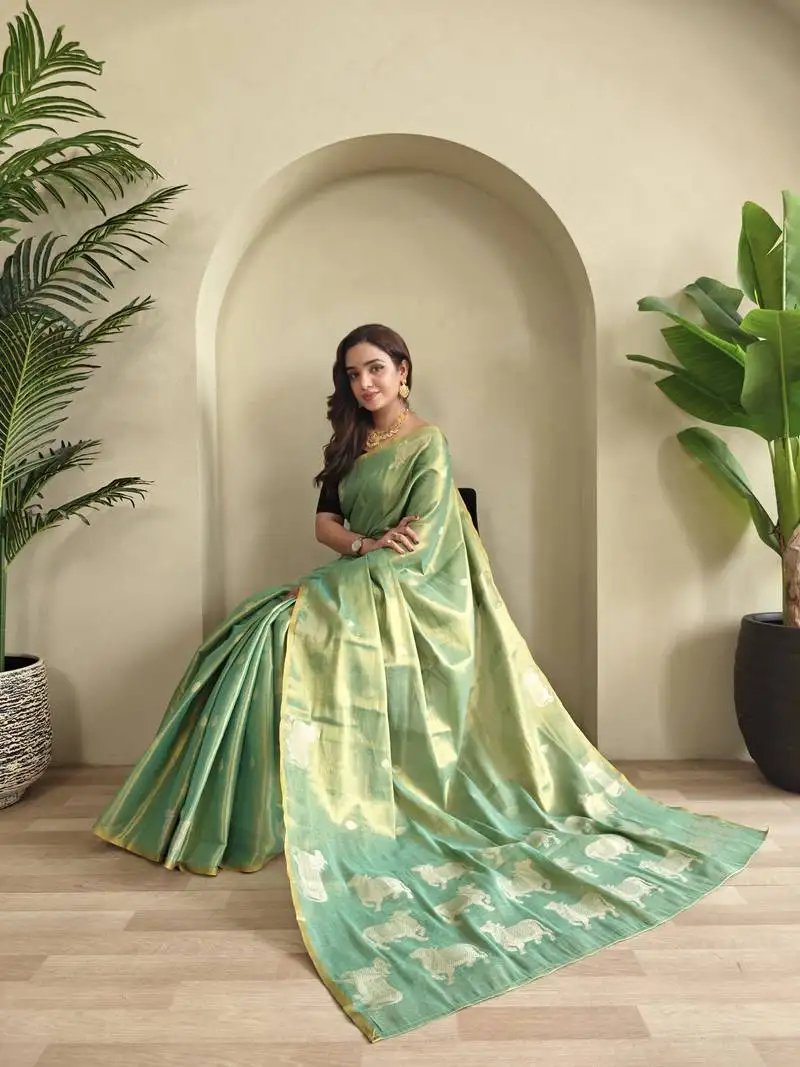 Sea green zari tissue weaving saree with all over pichwai pattern