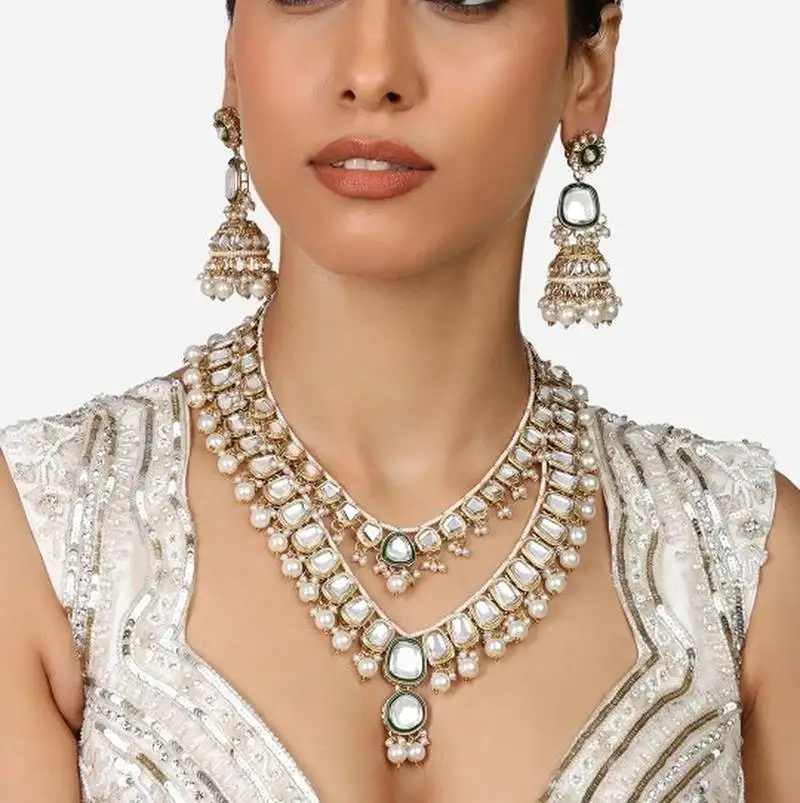 Gold-plated kundan bridal necklace set with pearls & green stones traditional indian jewelry for weddings & festive wear