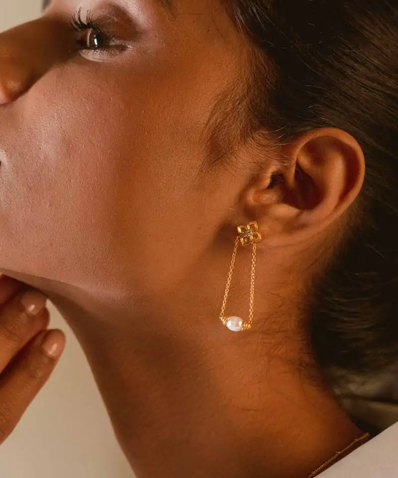 Gold pearl drop earrings