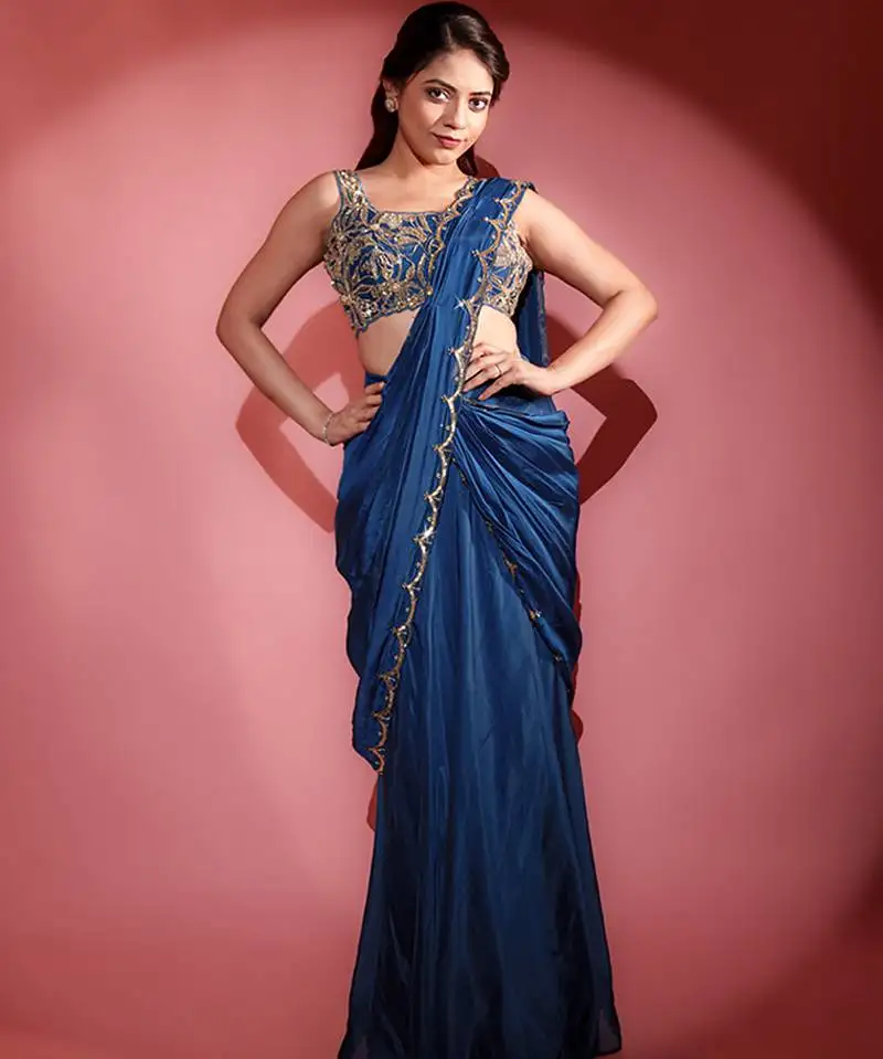 Blue organza embroidered saree with scallop border