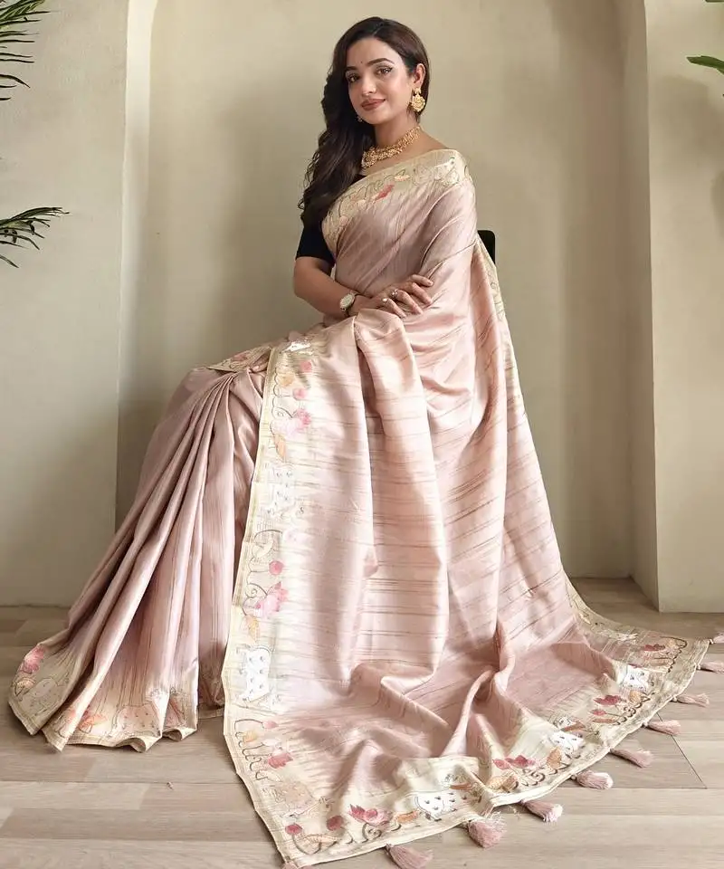 Peach tussar saree with pichwai style embroidery