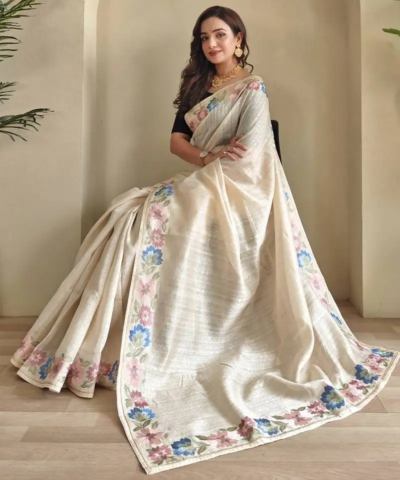 Cream tussar saree with contrast embroidery