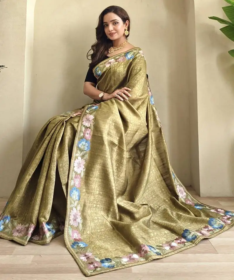 Green tussar saree with contrast embroidery