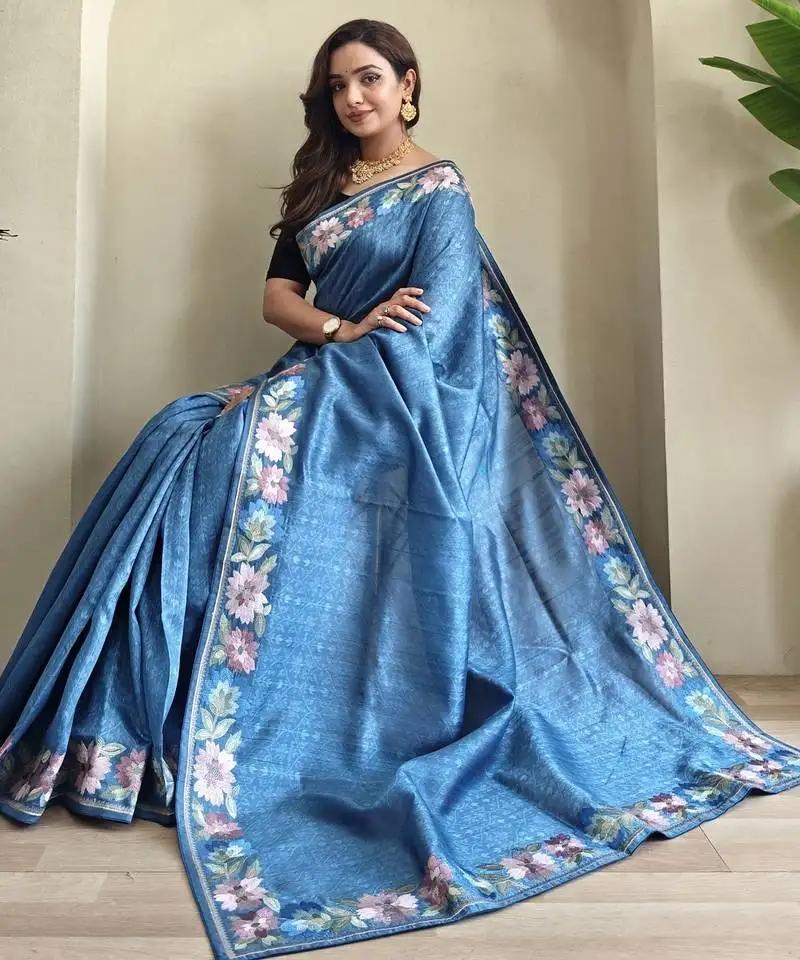 Teal tussar saree with contrast embroidery