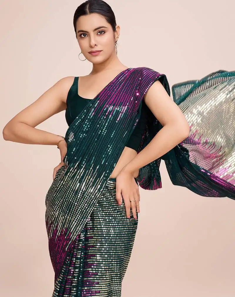 Green embellished georgette saree with unstitched blouse