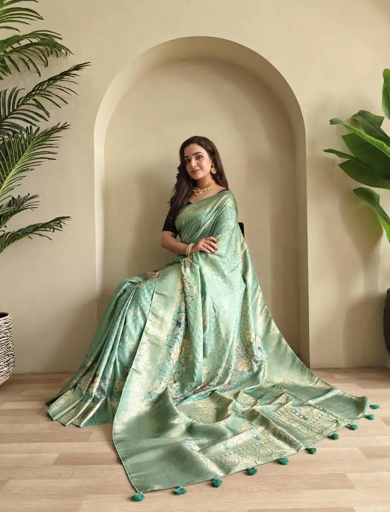 Sea green viscose georgette saree with weaving design