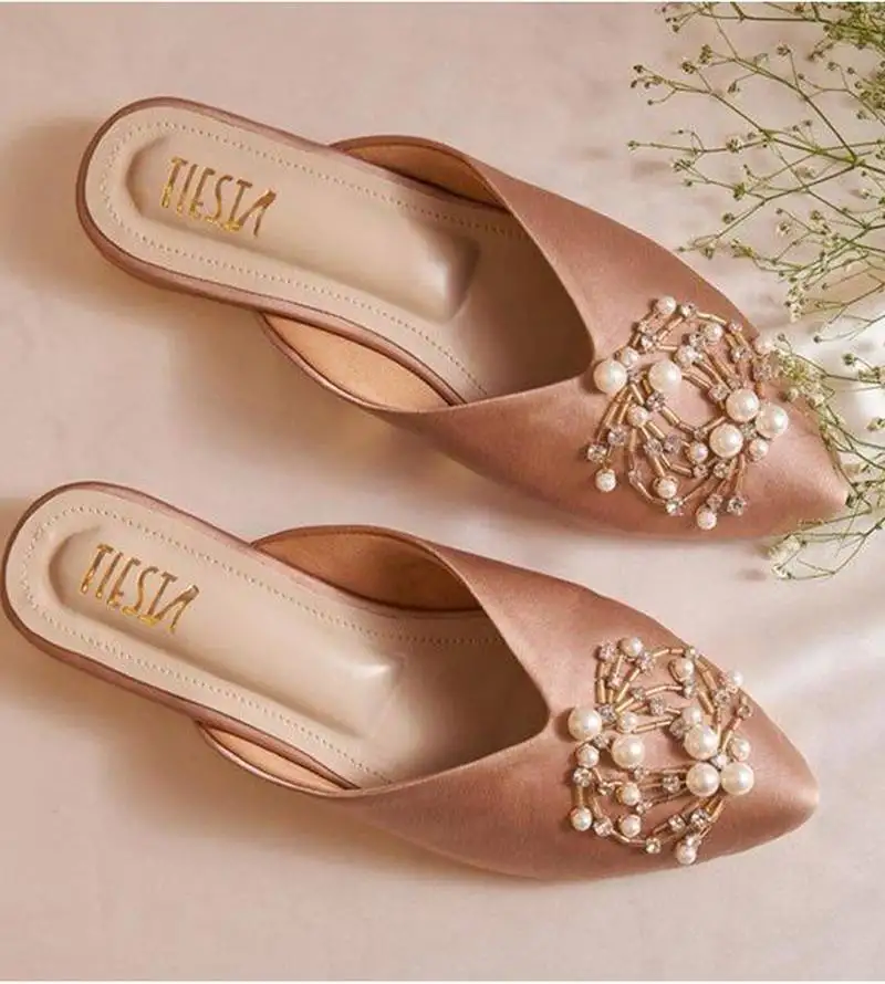 Pink embroidered leather flats