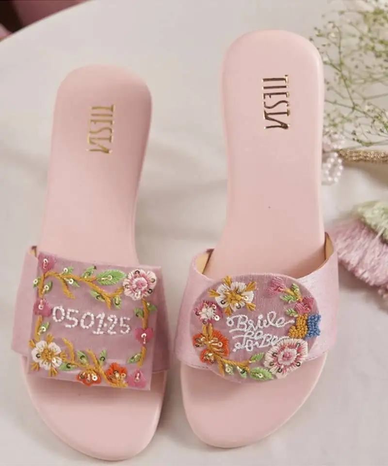 Purple embroidered leather flats