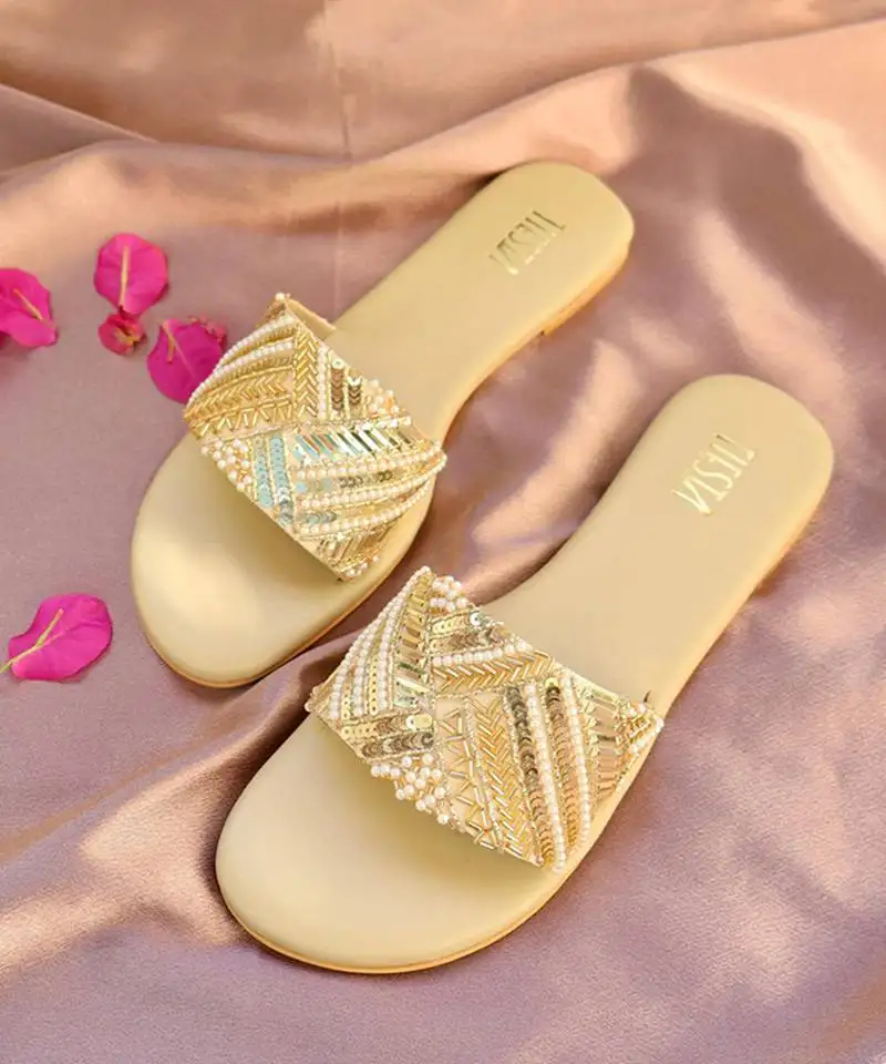 Beige embroidered leather flats