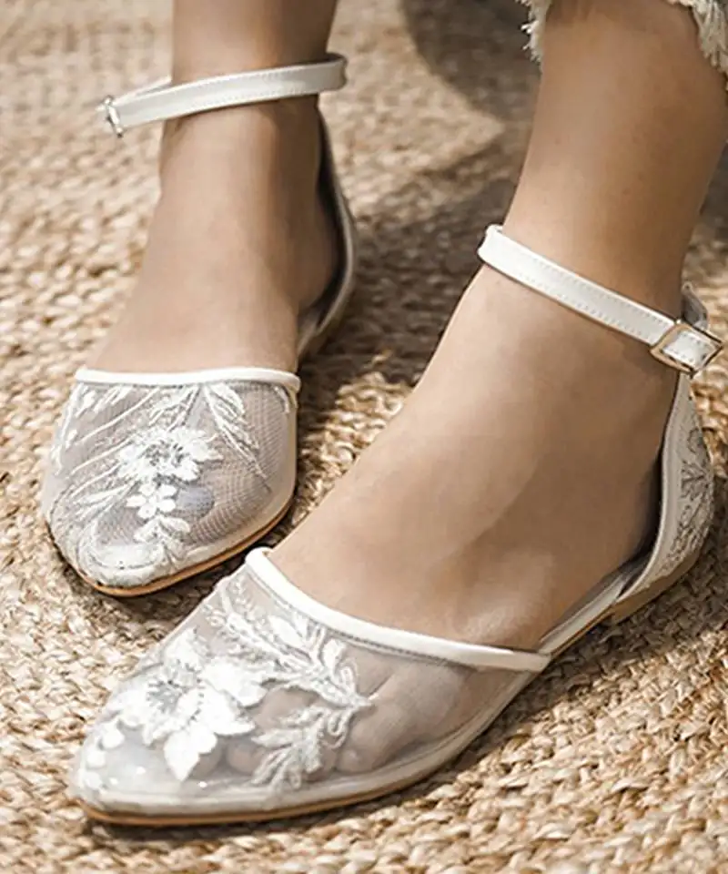 White embroidered synthetic leather sling back flats