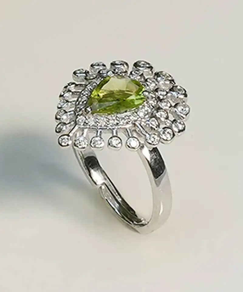 Green jewellery ring with sterling silver base