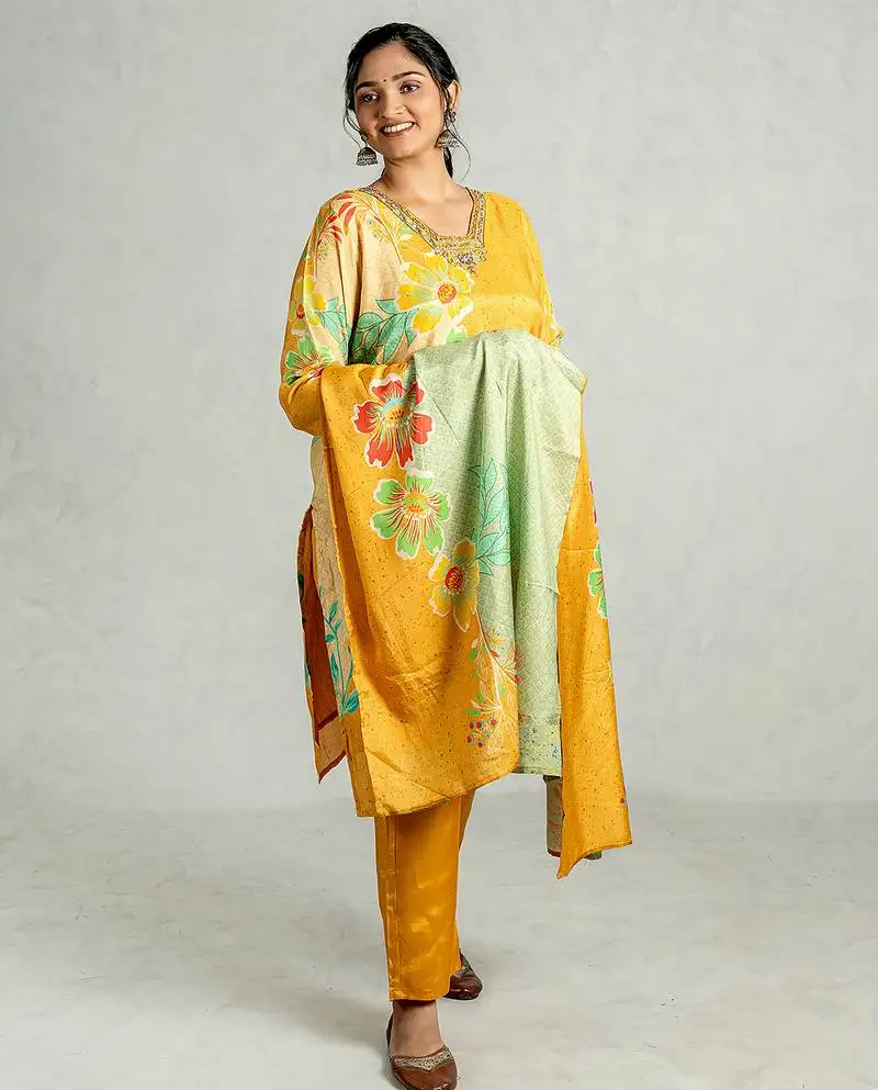 Yellow muslin silk kurta pant set with dupatta