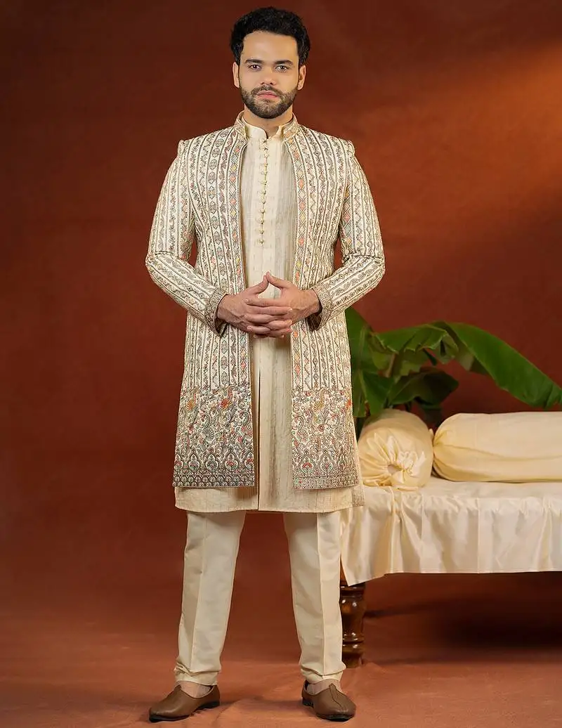 Cream heavy embroidered front open sleeveless jacket kurta set