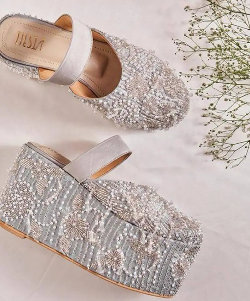 Silver woven leather wedges