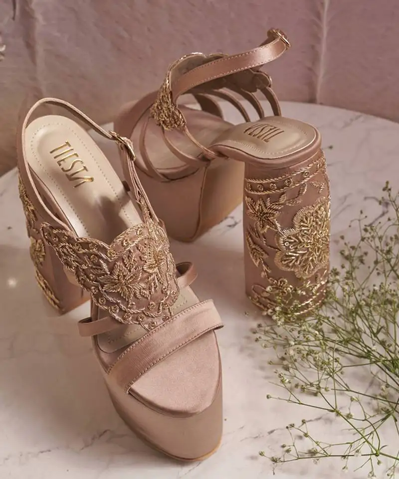 Nude woven leather heels