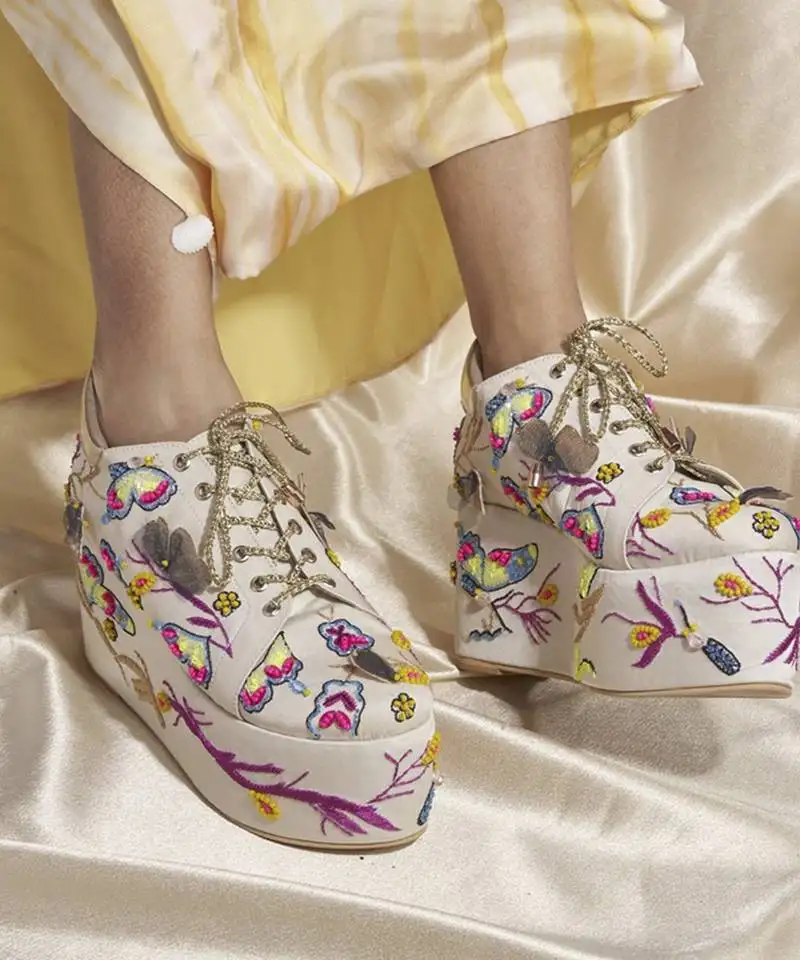 White woven leather wedges