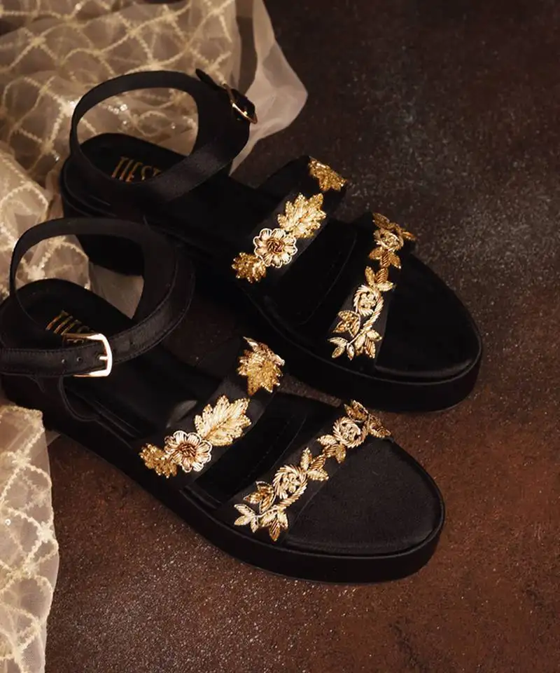 Black woven leather sandals