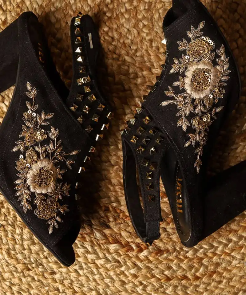 Black woven leather heels