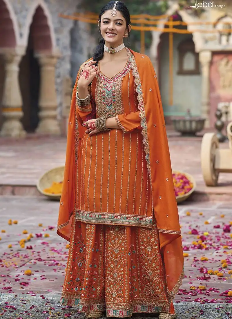 Orange chinon silk embroidered designer palazzo suit stitched