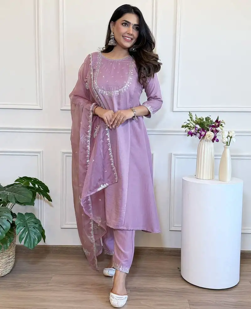 Elegant purple colored party wear embroidered stitched silk pant style kurti suit with duppatta