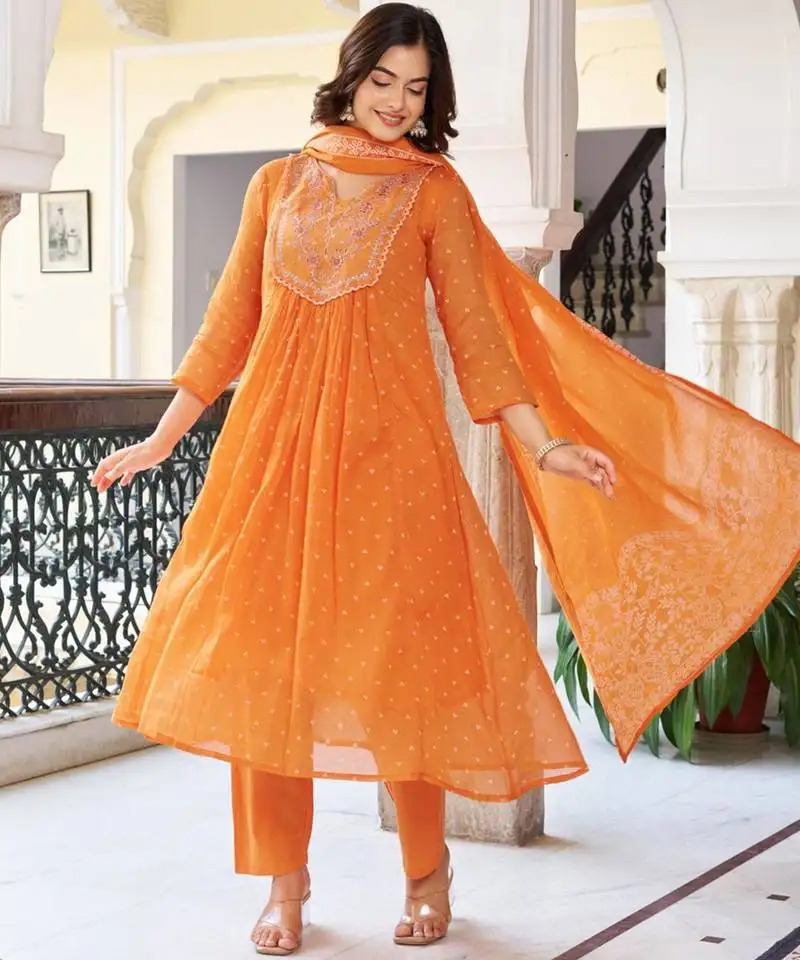 Elegant orange colored party wear embroidered stitched cotton pant style kurti suit with duppatta