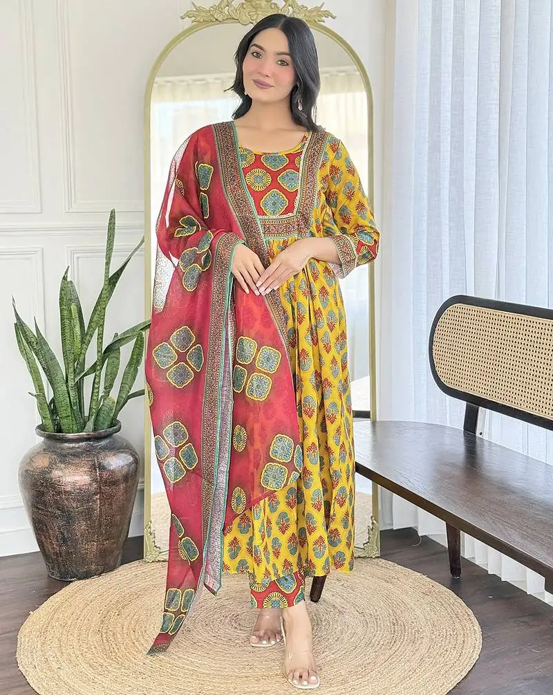 Elegant yellow colored party wear print stitched rayon pant style kurti suit with duppatta