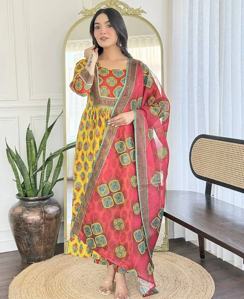 Women's yellow rayon printed flared kurta with rayon pant and linen printed dupatta sets