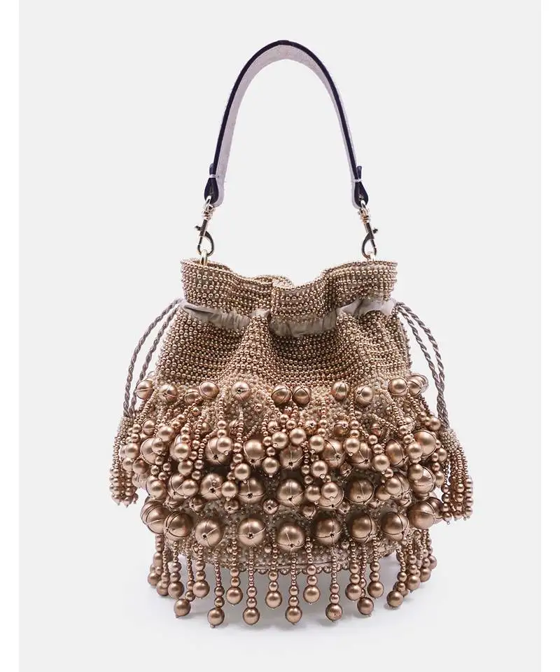 Embellished golden potli bag with drawstring