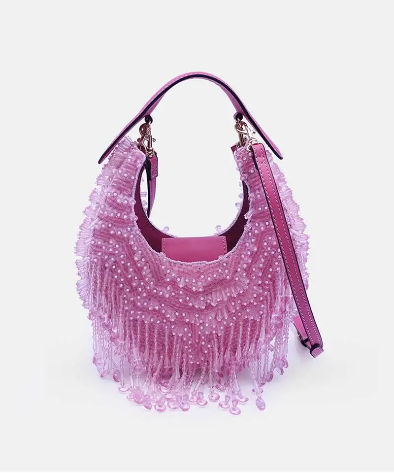 Pink crystal-embellished clutch bag with sling