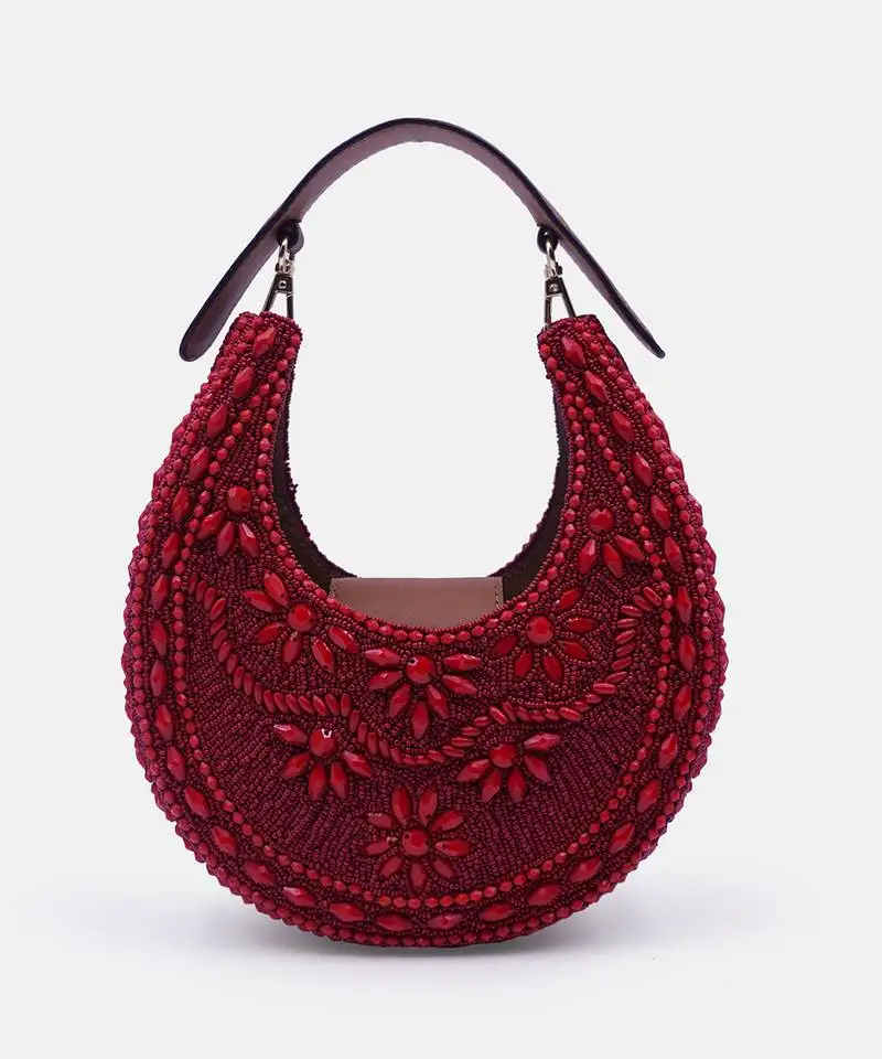 Maroon color embellished clutch bag