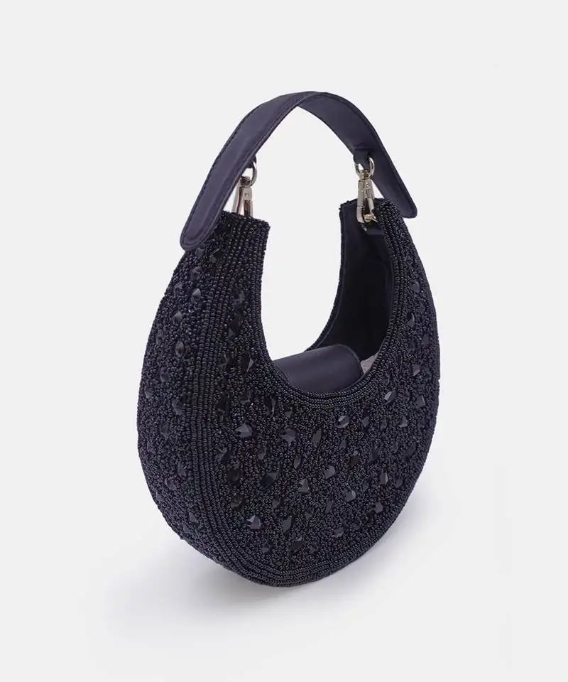 Black bead-embellished clutch bag