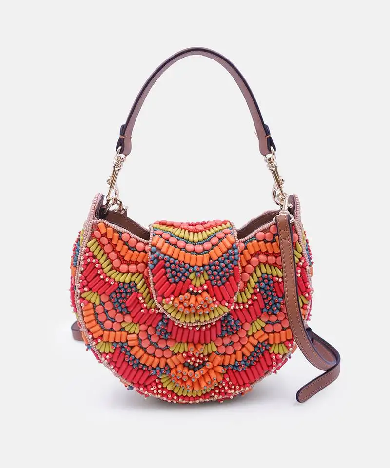 Orange beaded clutch bag with detachable leather crossbody strap