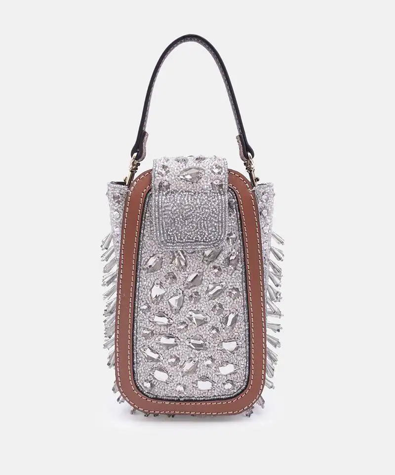 Silver clutch bag with detachable leather crossbody sling