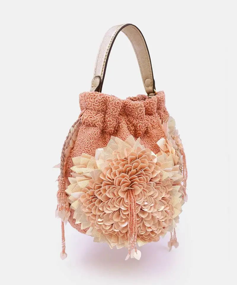 Hand embroidered peach potli bag with drawstring