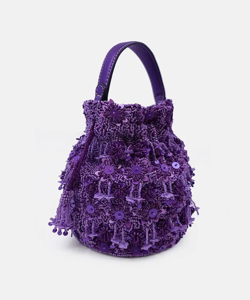 Hand embroidered purple potli bag with drawstring