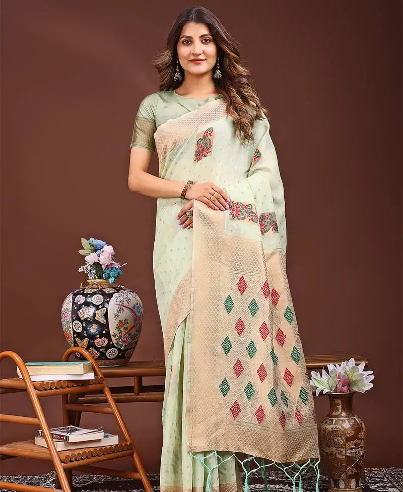 Light green jaquard saree with tassels