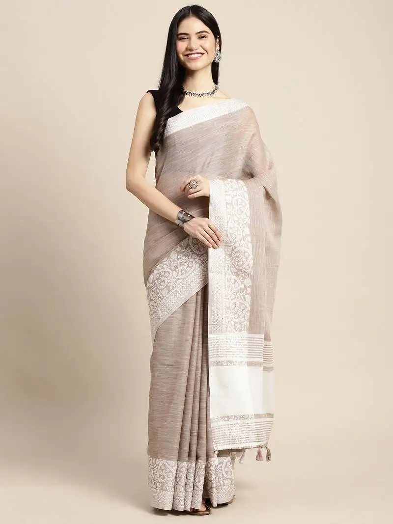beige woven linen saree with contrast zari border & tassels
