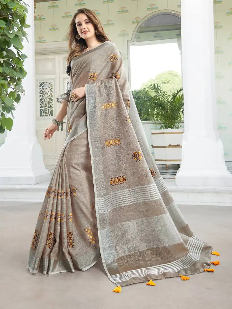 Light beige linen cotton embroidered saree