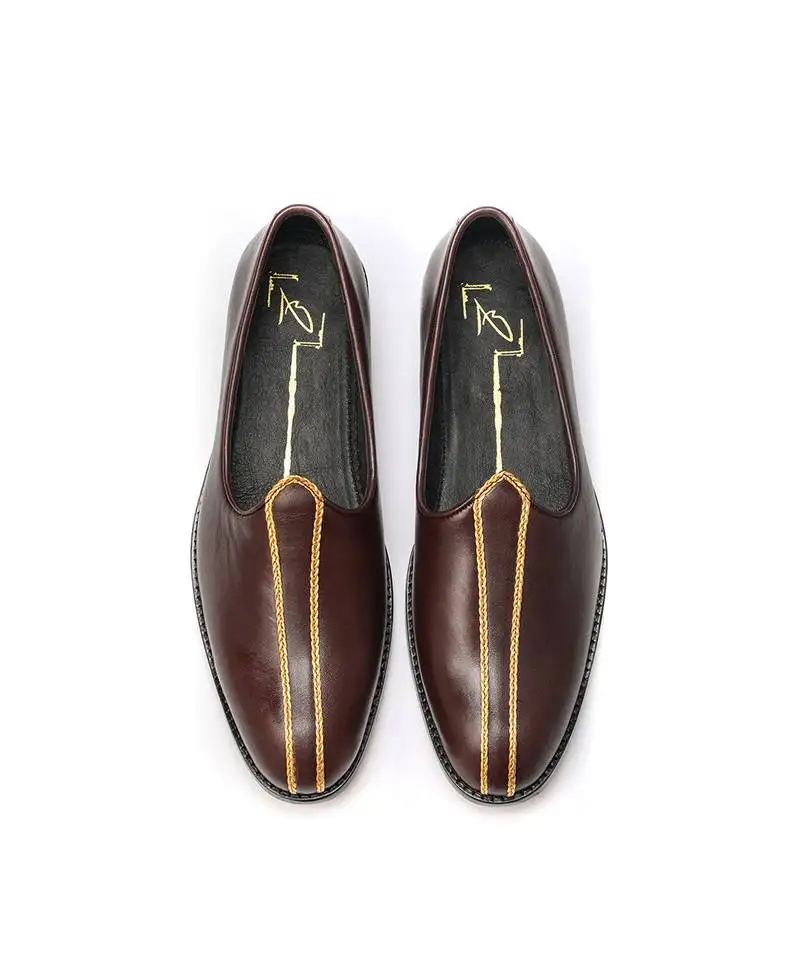 Tan napa leather finish mojadi with gold detailing