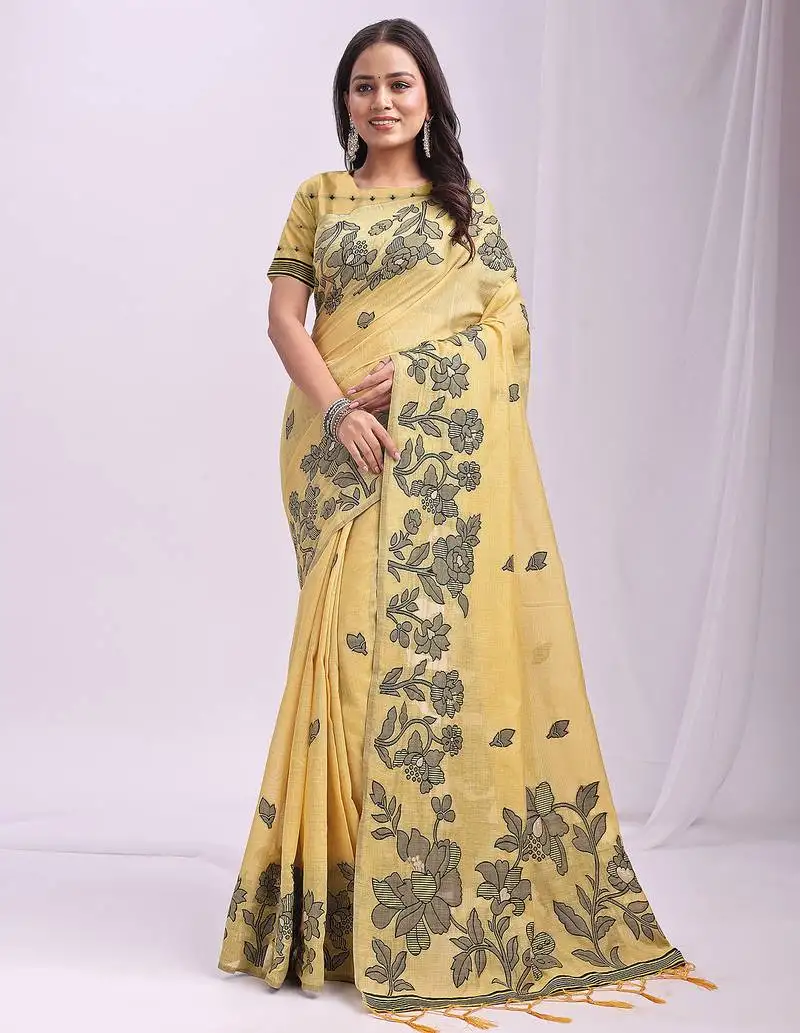 Yellow linen cotton saree with black floral print