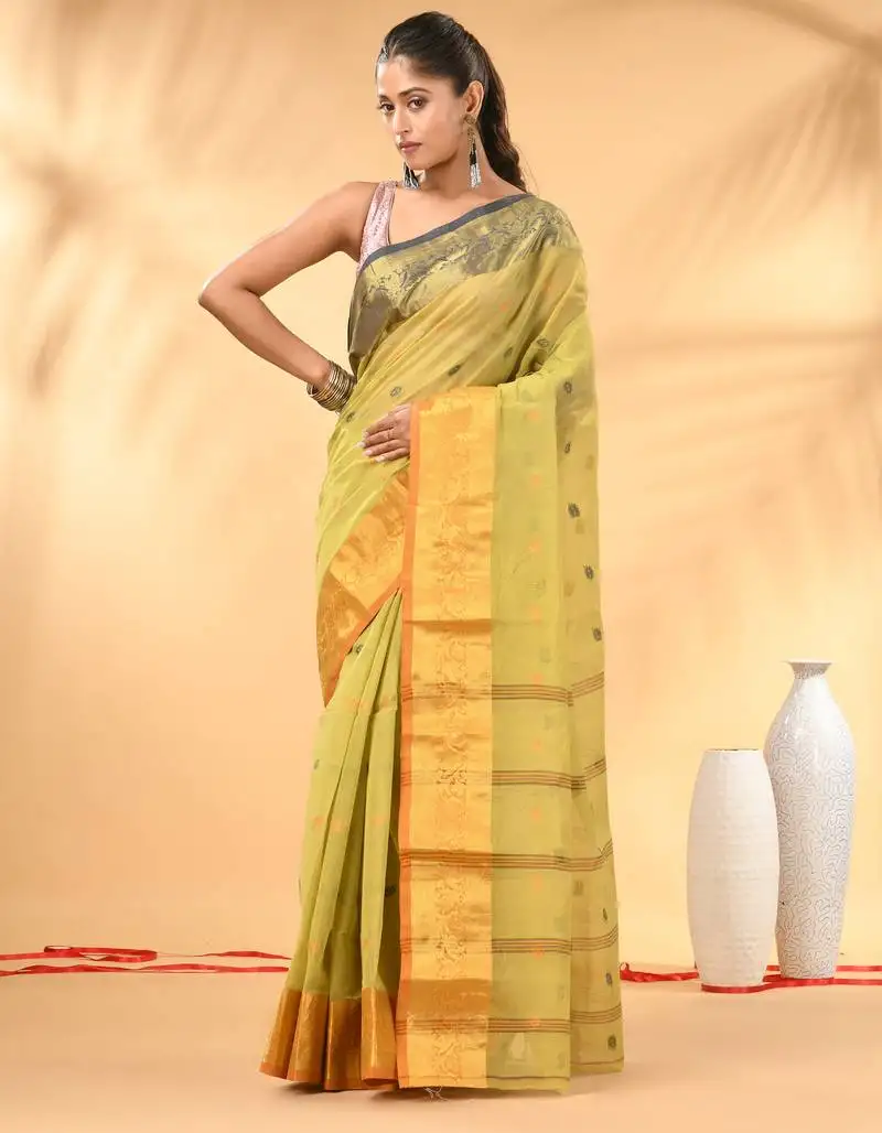 Pastel green tant pure cotton saree with contrasting zari border