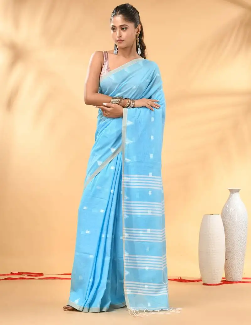 Sky blue soft cotton saree with subtle striped pallu