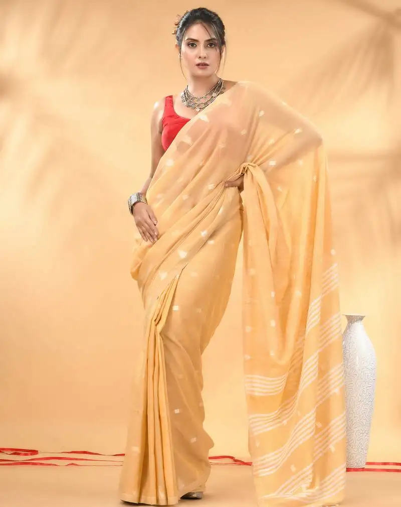 Beige soft cotton saree with subtle striped pallu