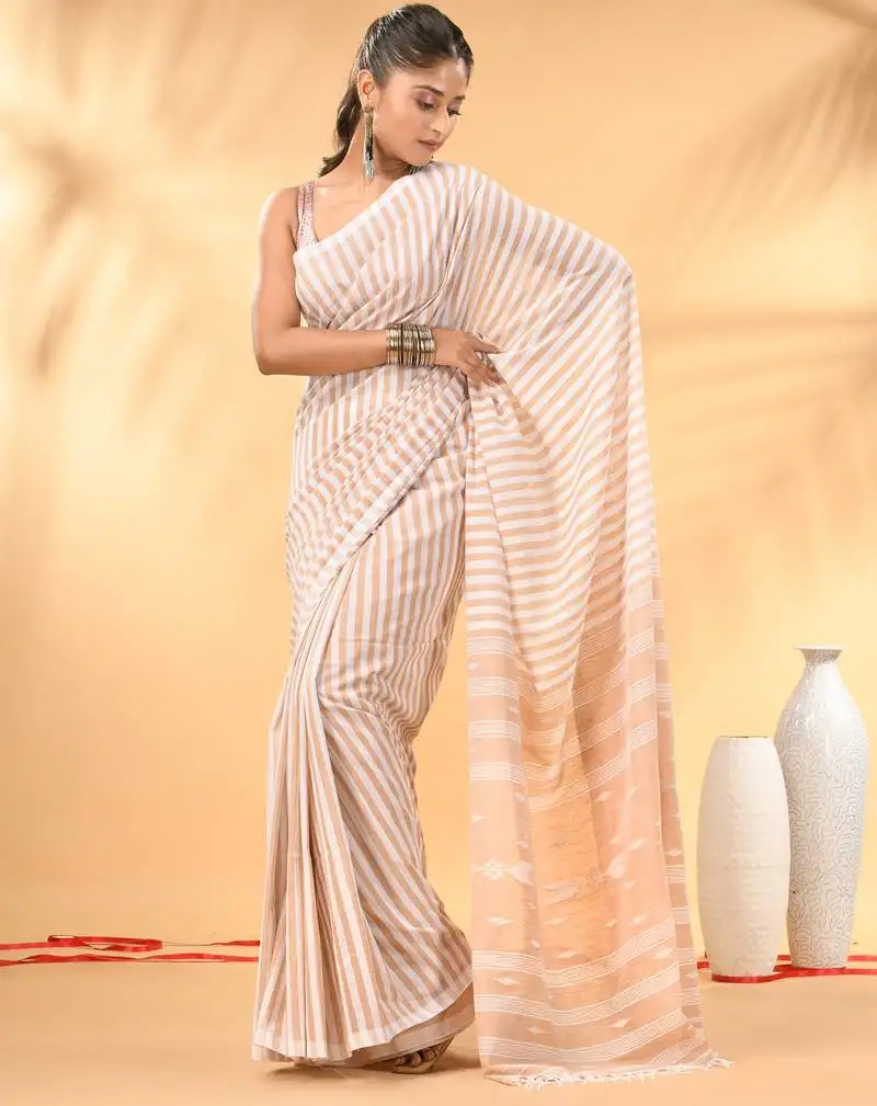 Beige and white handwoven cotton saree with all-over stripes and textured pallu