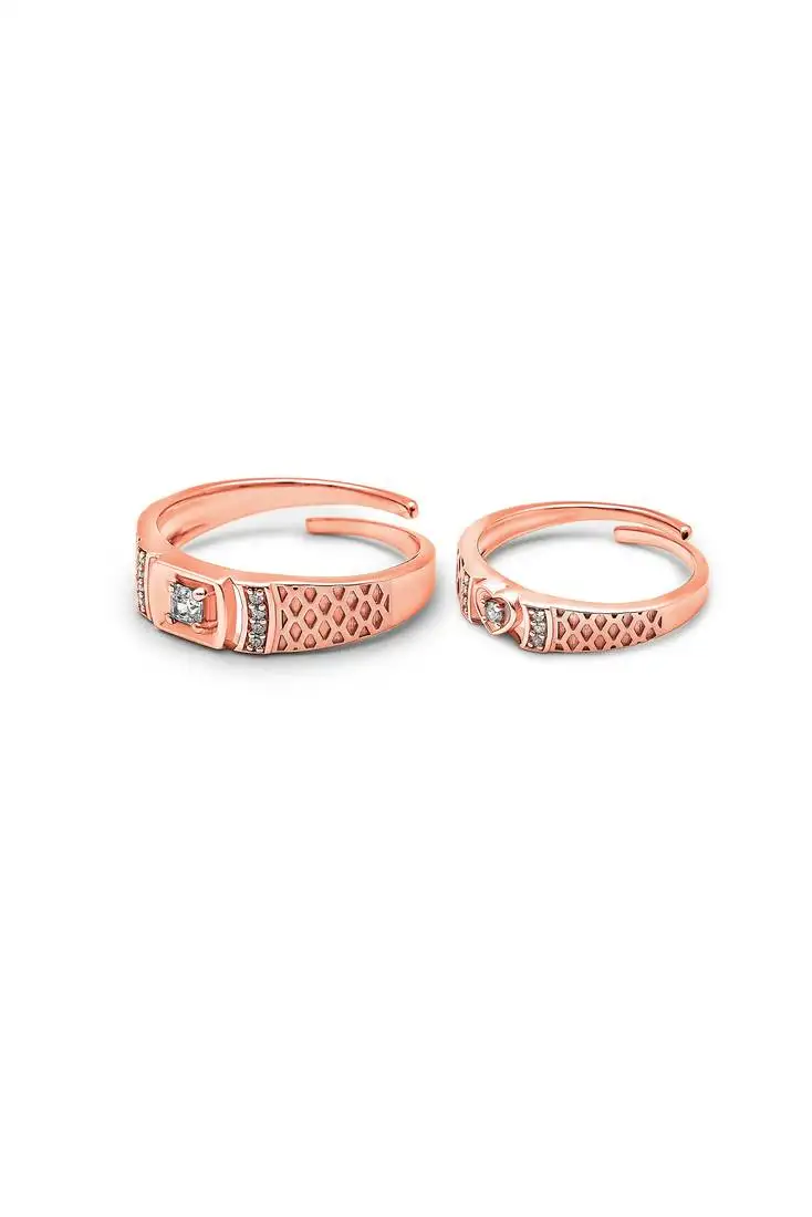Rose gold embrace couple rings
