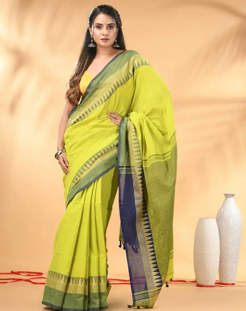 Lime green and navy blue cotton saree with geometric woven border