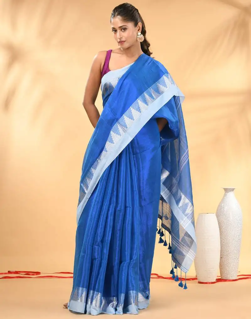 Sapphire blue and white tissue saree with woven geometric border
