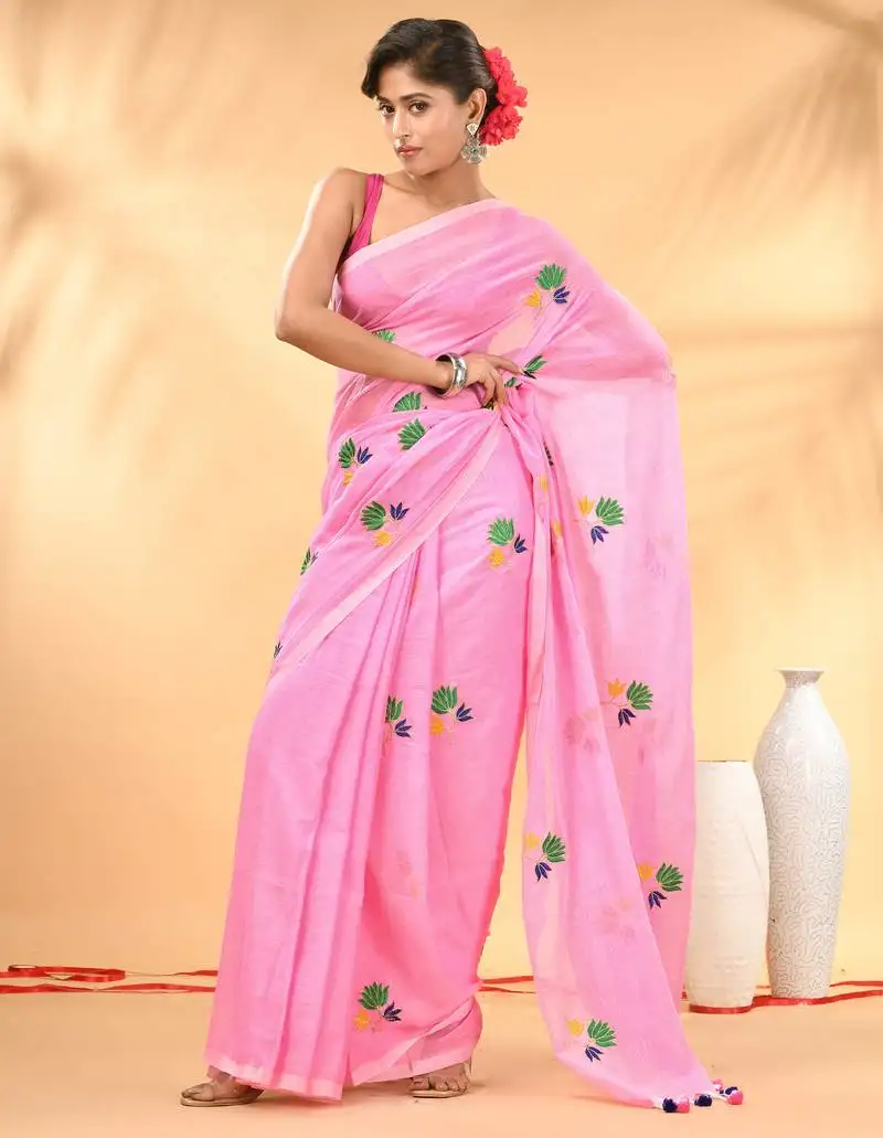Pink mulmul cotton saree with floral embroidery and tassel detailing