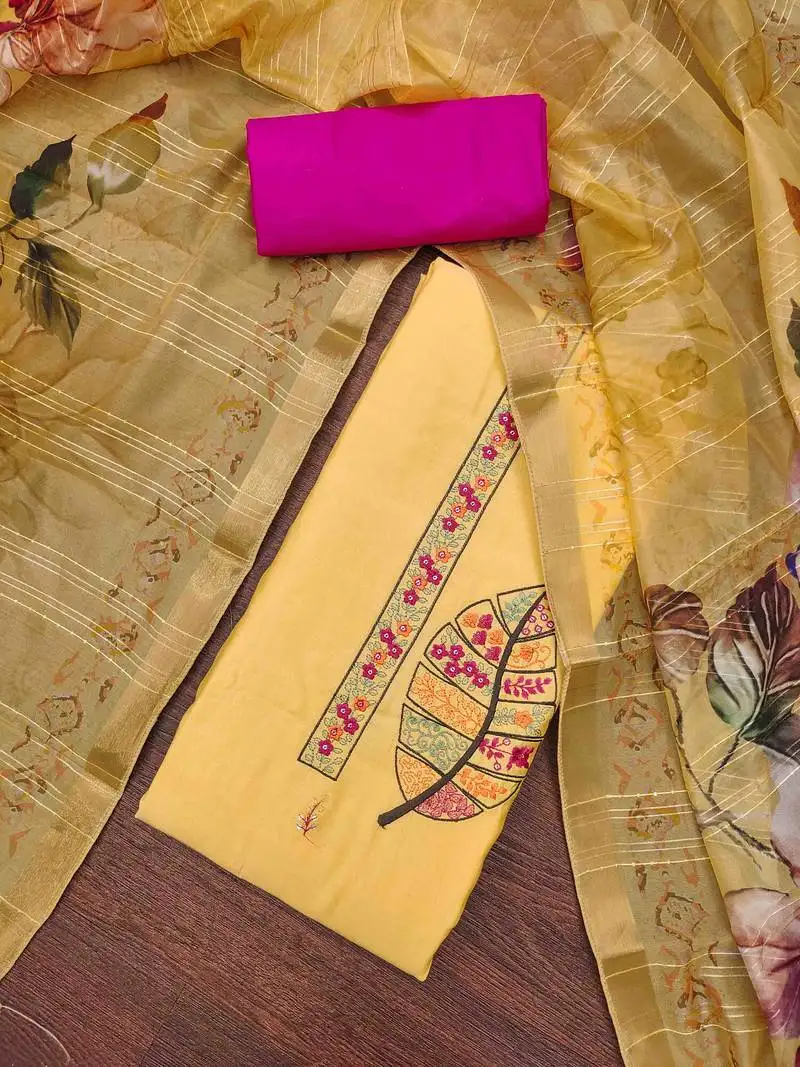 Women's yellow cotton silk handwork unstitched dress material