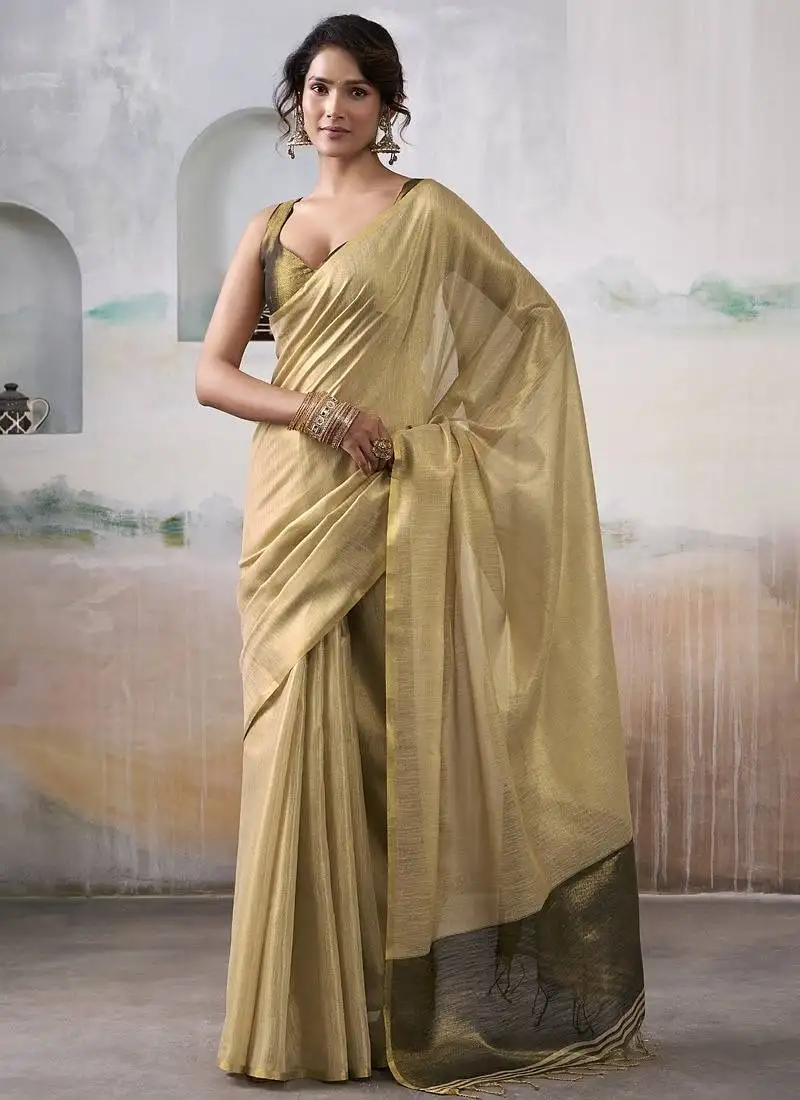 Cream tissue silk with beautiful tussle festival wear saree